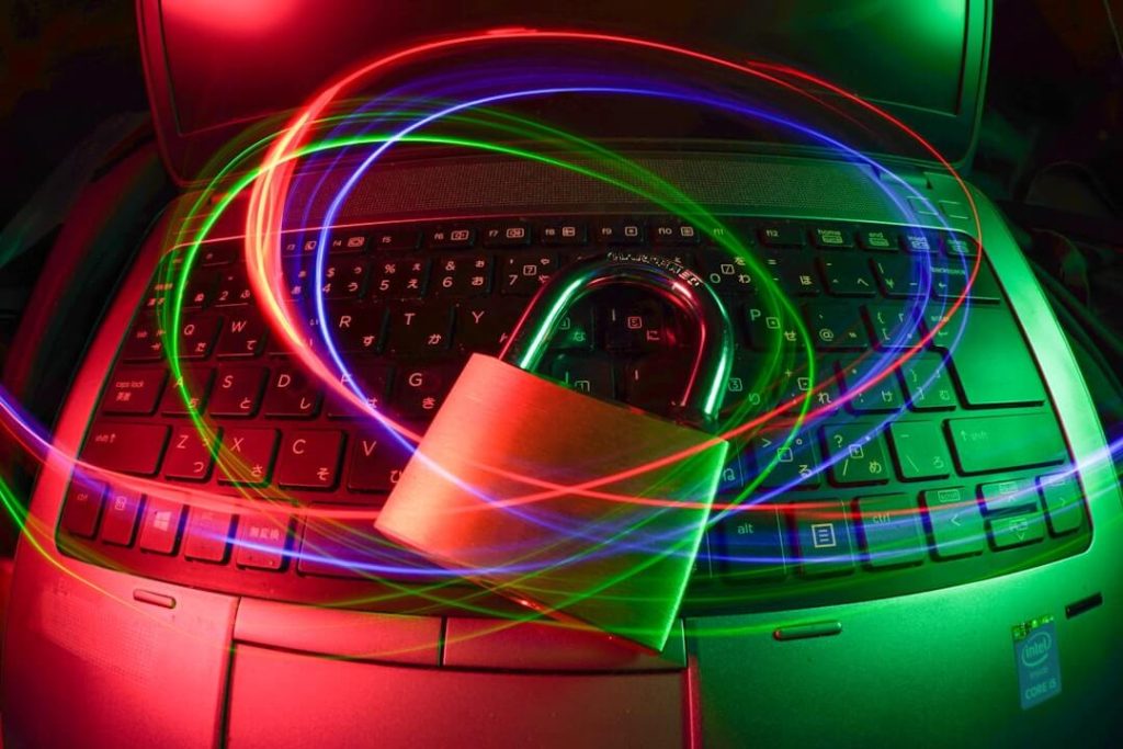 padlock-on-laptop-with-light-trails-c5pxrfejq3w padlock-on-laptop-with-light-trails-c5pxrfejq3w